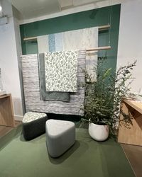 A room featuring green walls and matching green furniture, creating a cohesive and vibrant interior design.